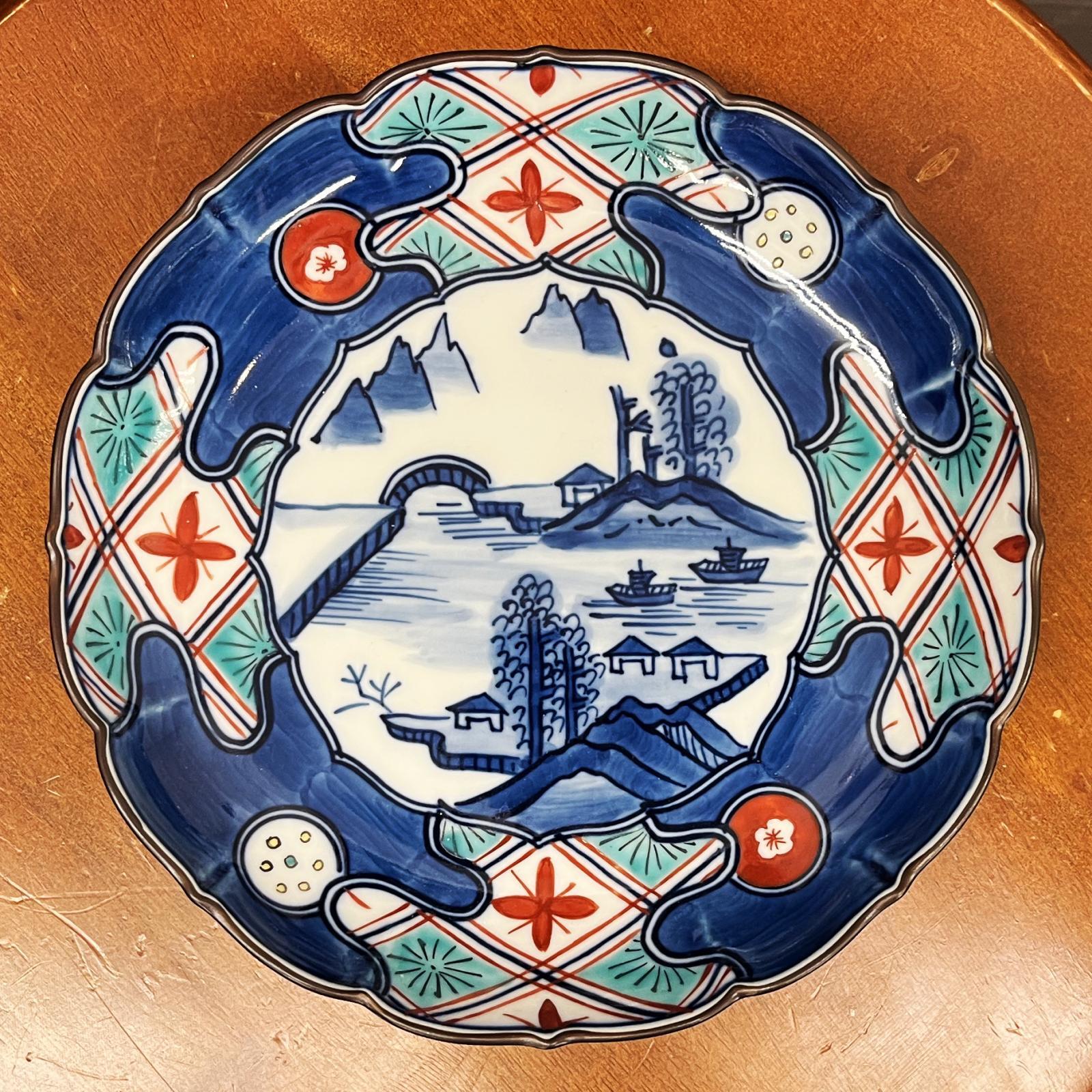 Imari-style small plate with landscape medallion