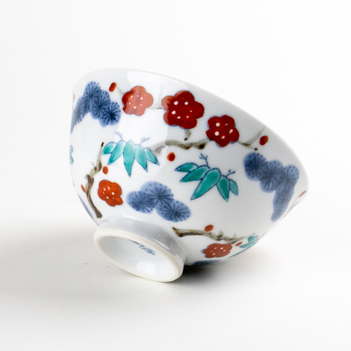 Arita rice bowl with Akae pine, bamboo, and plum motifs