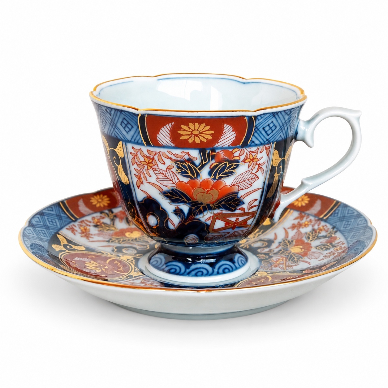 Arita coffee cup with blue underglaze, Akae, and gold decoration
