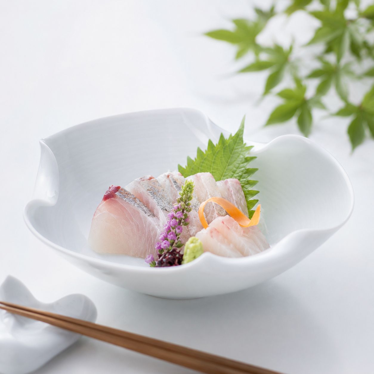 Sashimi served in a Hakuji white porcelain bowl
