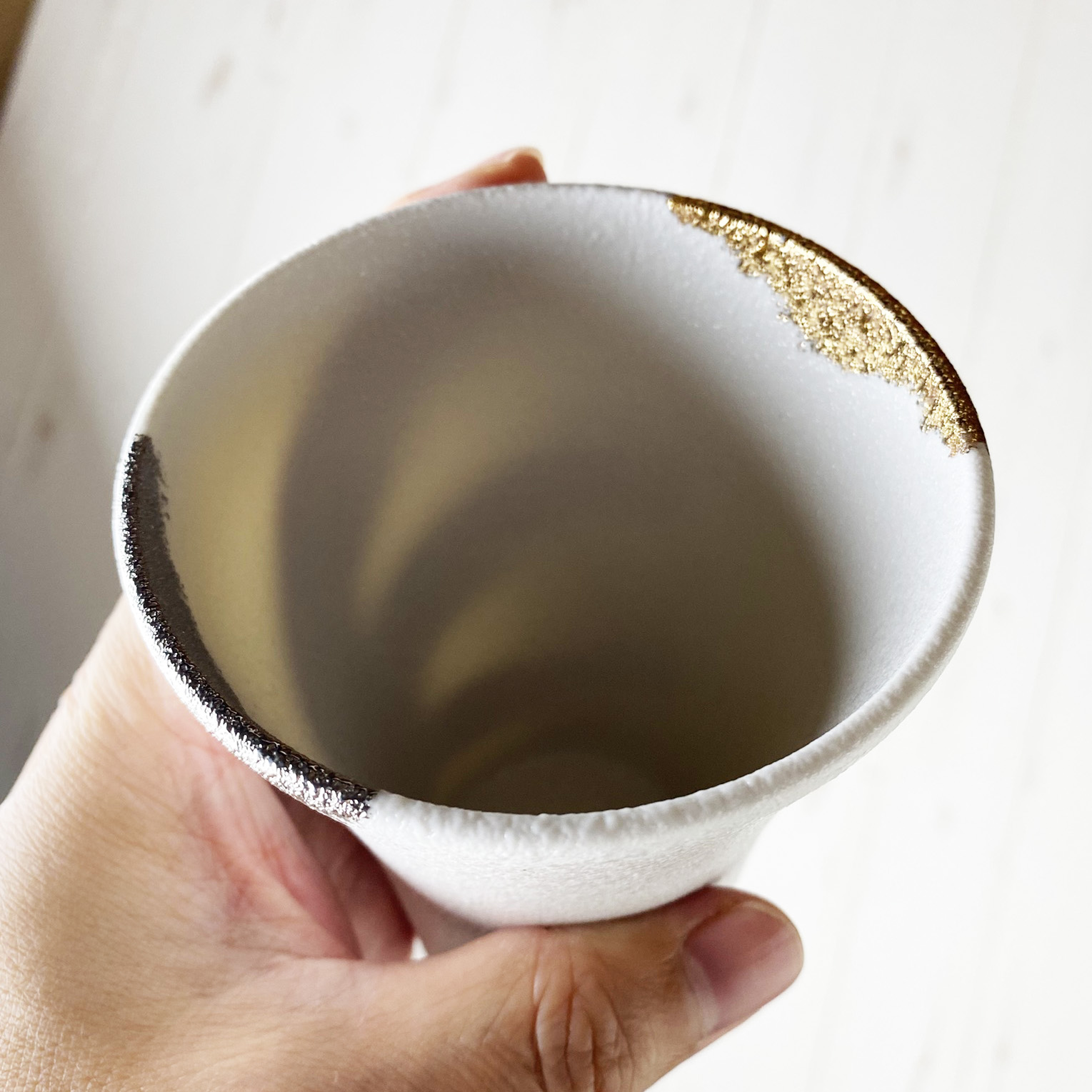 Light passing through a thin porcelain teacup