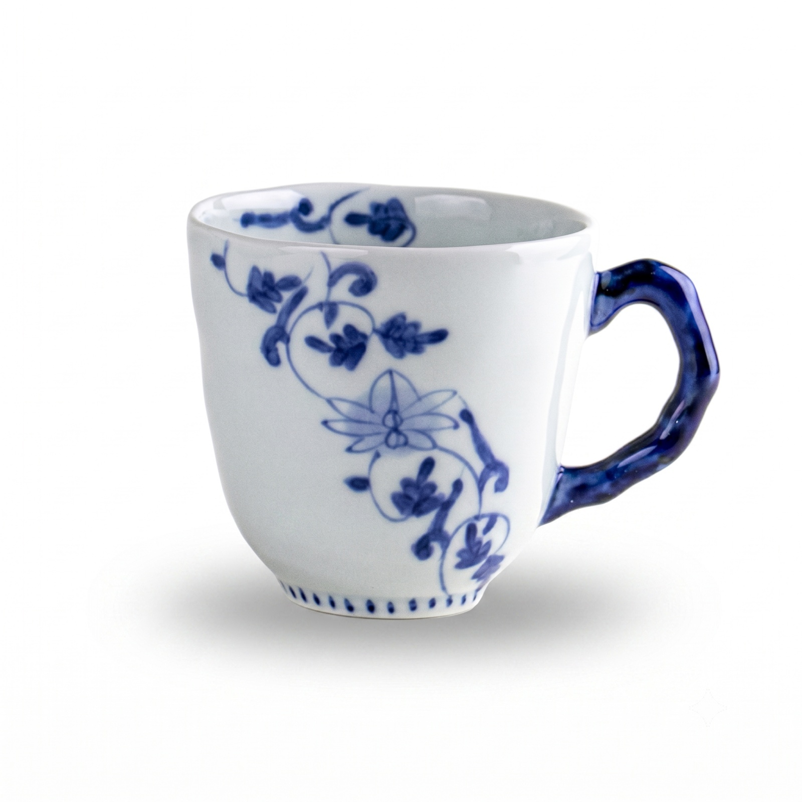 Sometsuke mug decorated with a Hana Karakusa floral arabesque pattern