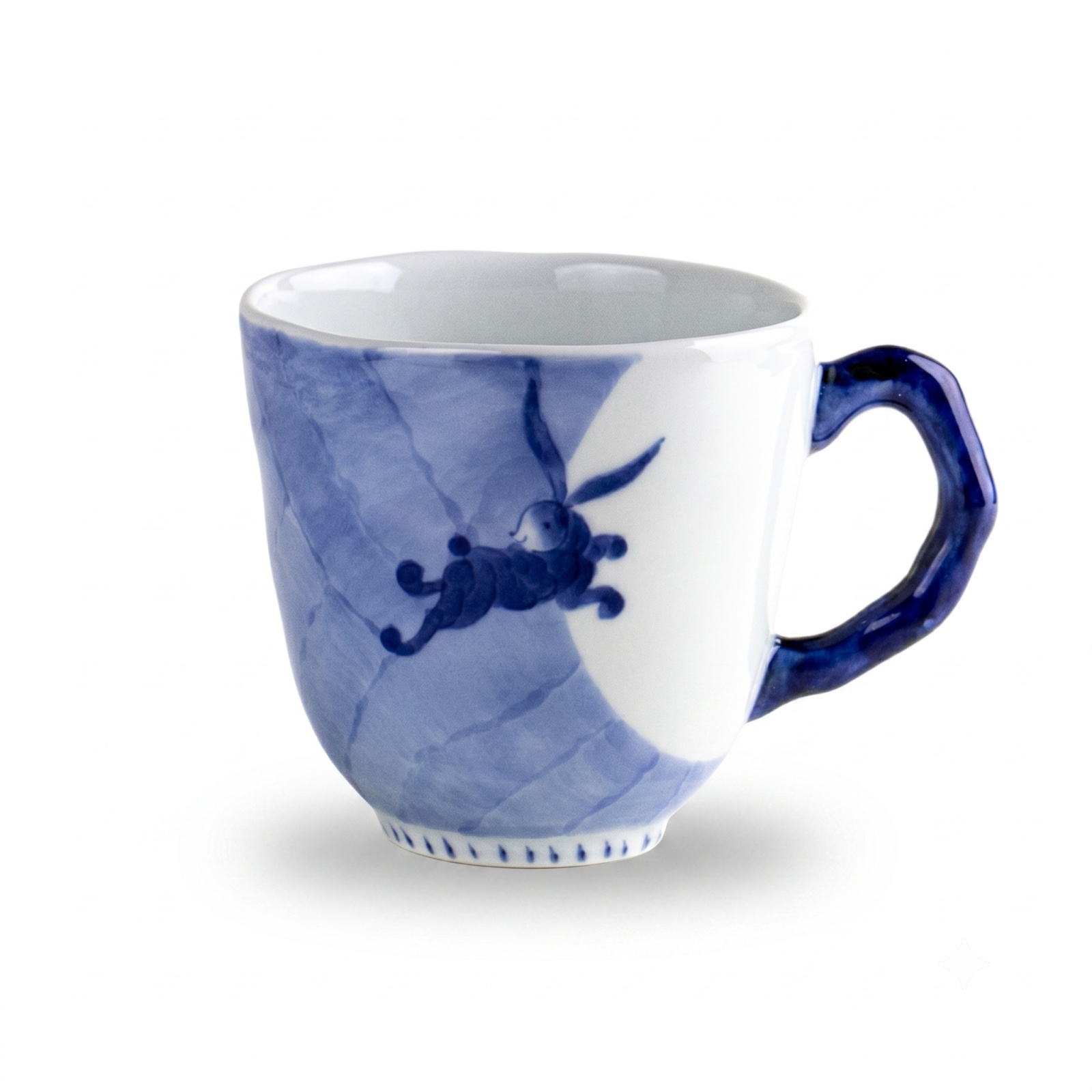 Sometsuke mug decorated with a rabbit using different shades of blue