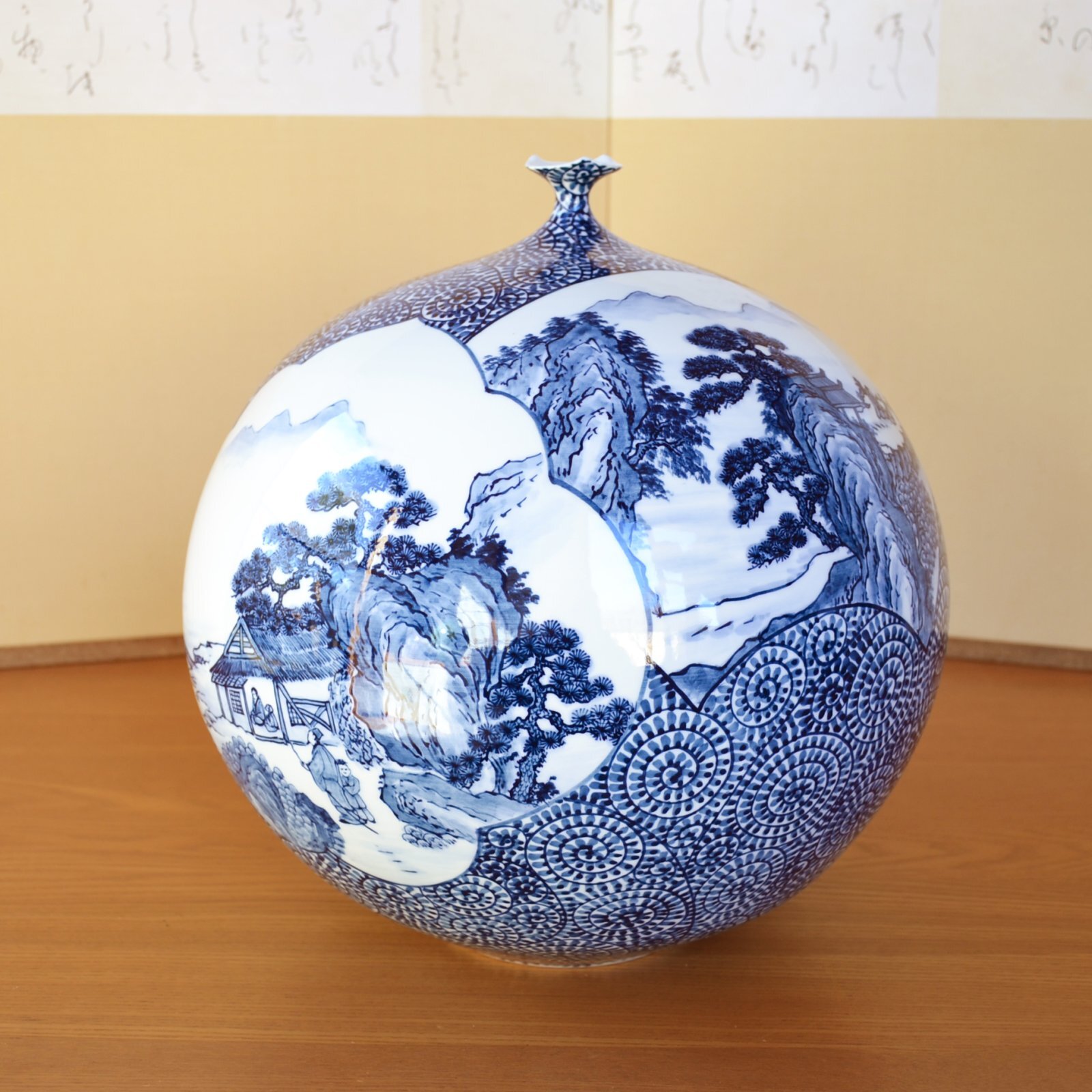 Arita ware Sometsuke vase decorated with landscape and Tako Karakusa patterns