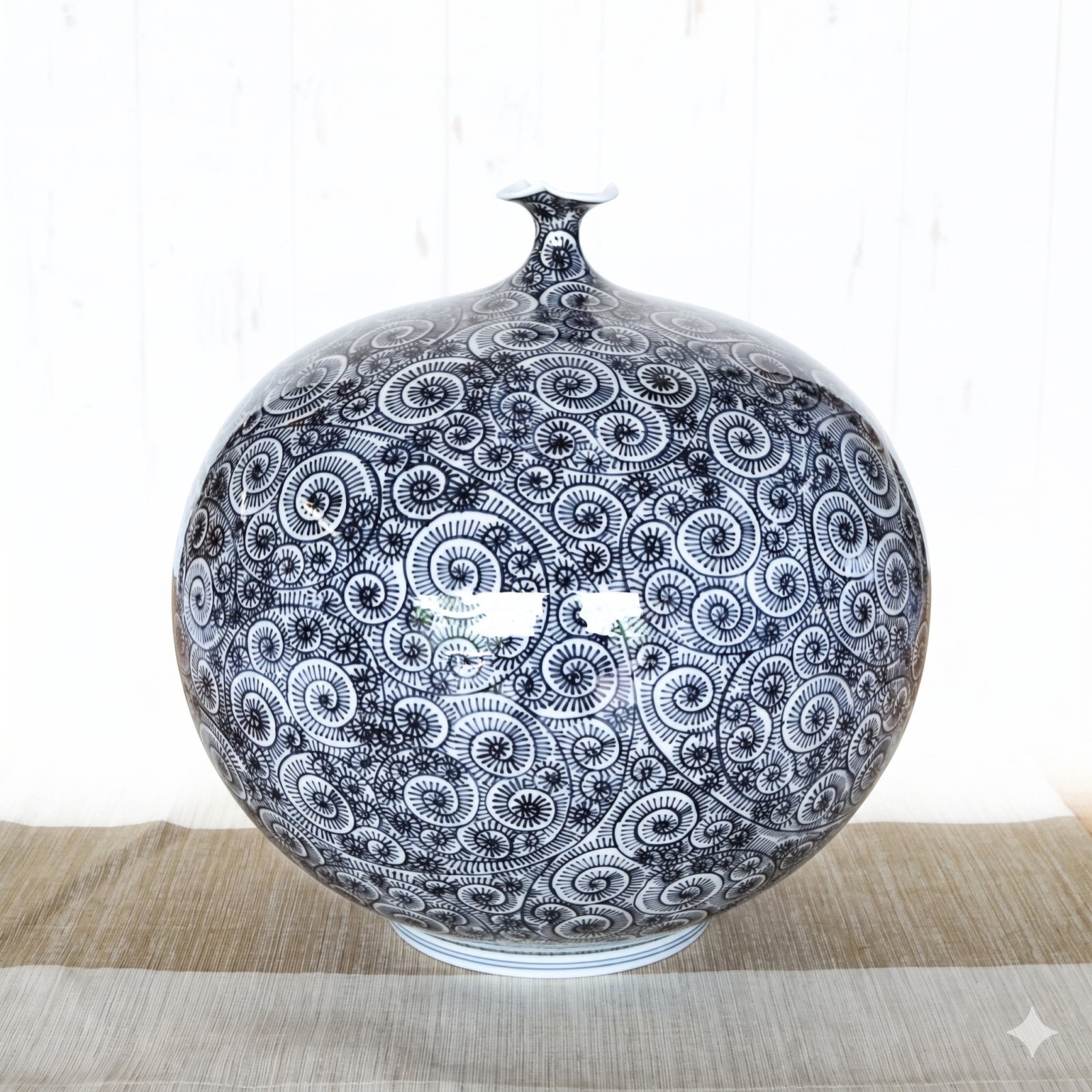Arita ware Sometsuke vase decorated with the traditional Tako Karakusa pattern